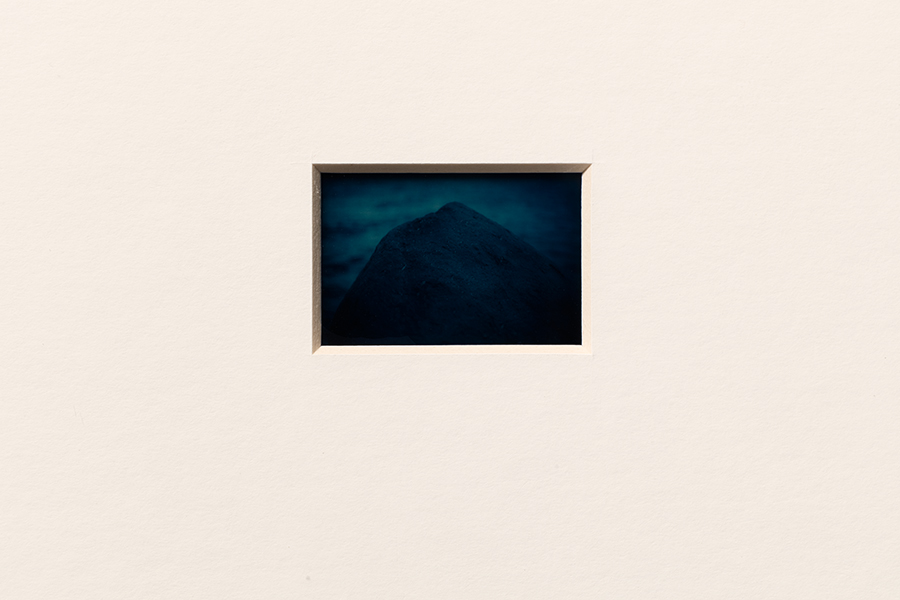 Framed ateloprosopia work showing a mounted horizontal diapositive