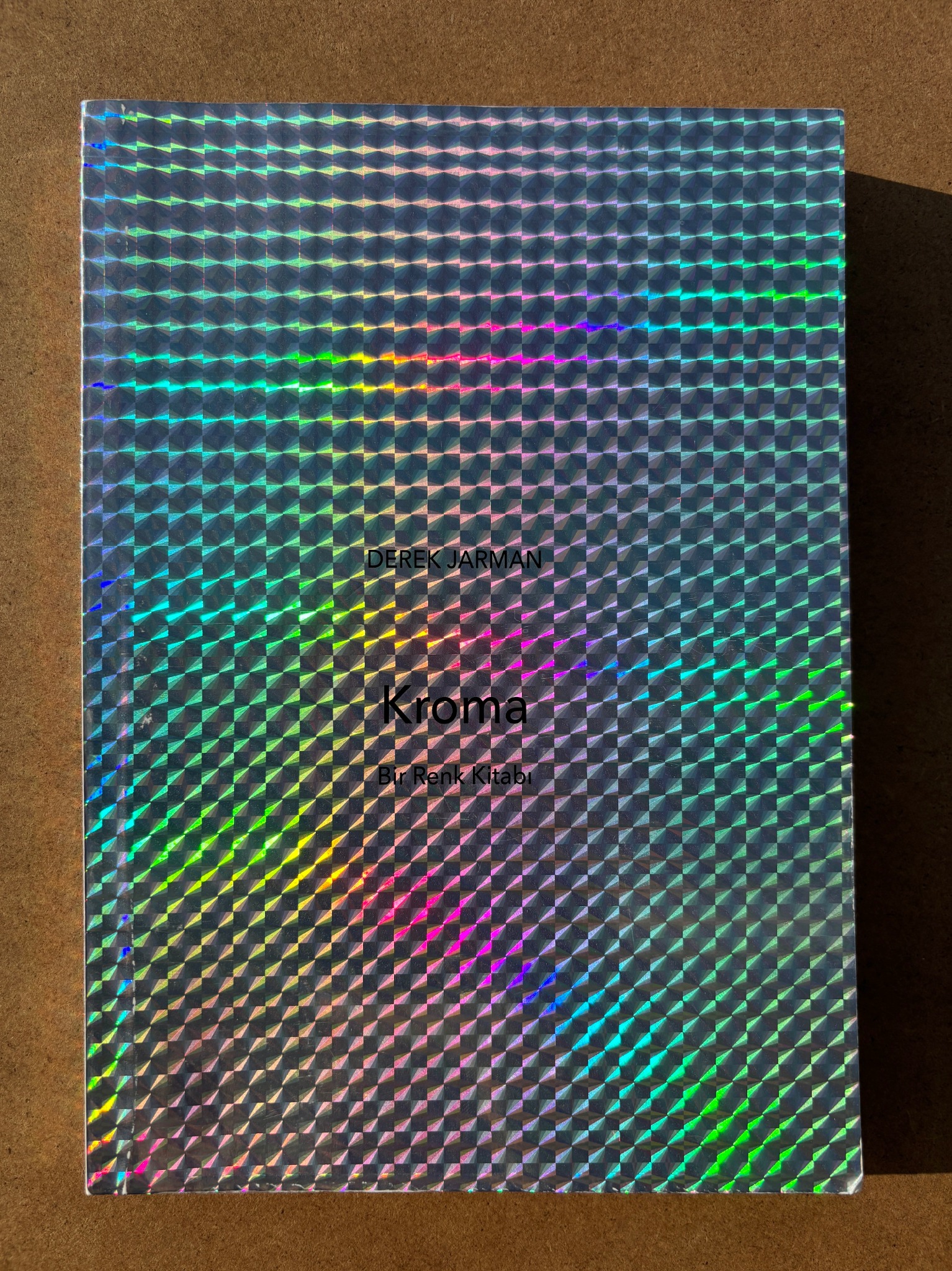 Holographic cardboard cover of the Turkish translation of Derek Jarman’s Chroma / Kroma
