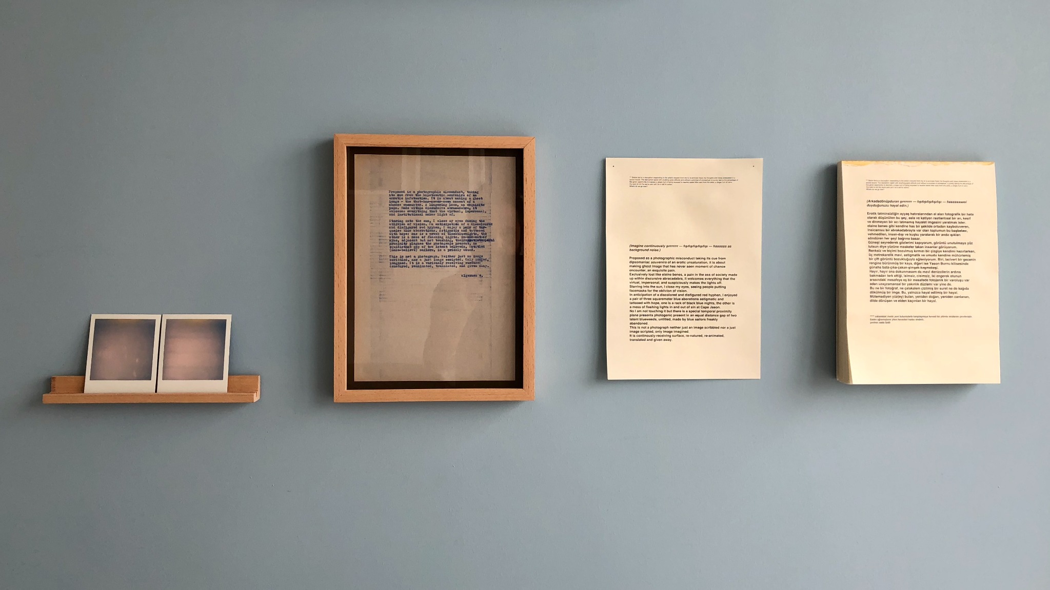 (5 parçada) umut / hope (in 5 parts), installed on a blue-grey wall